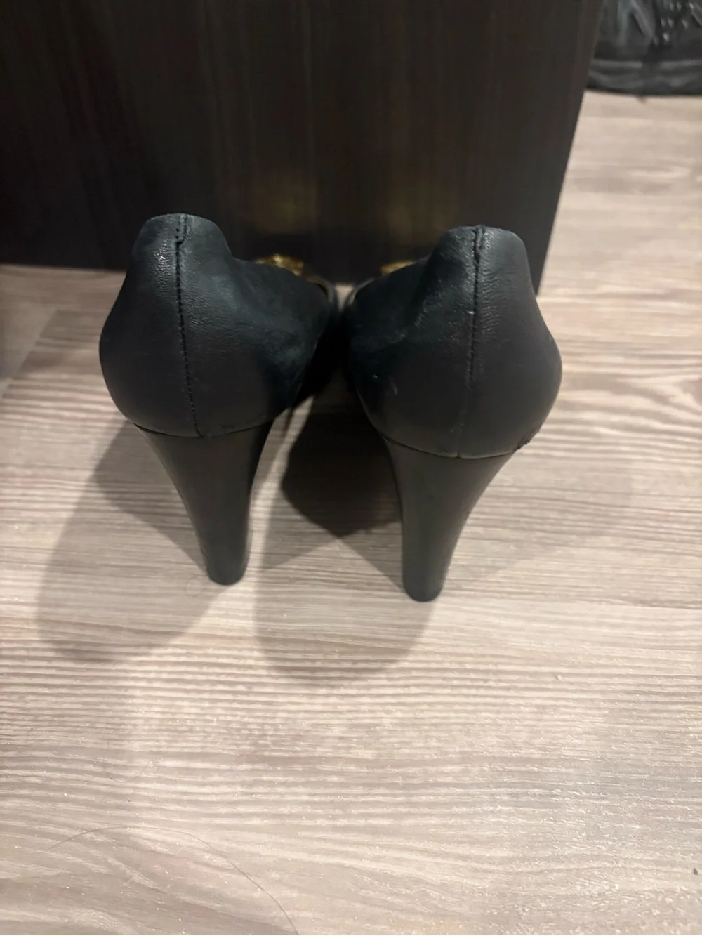 Tory Burch Black Leather Peep-Toe Pumps with Gold Logo Medallions